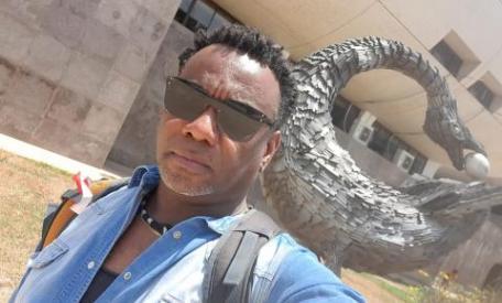 The first selfie I took of myself here was with this statue of the Bono Adinkra symbol Sankofa.